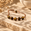 Handmade Feral Copper glass bead bracelet displayed on stone