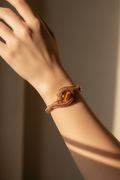 Artisan handcrafted copper cuff bracelet with mystic aura quartz displayed on wrist