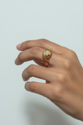 Model wearing the Jade Tide handmade green jade copper wire wrapped ring, highlighting its elegant fit and nature-inspired design