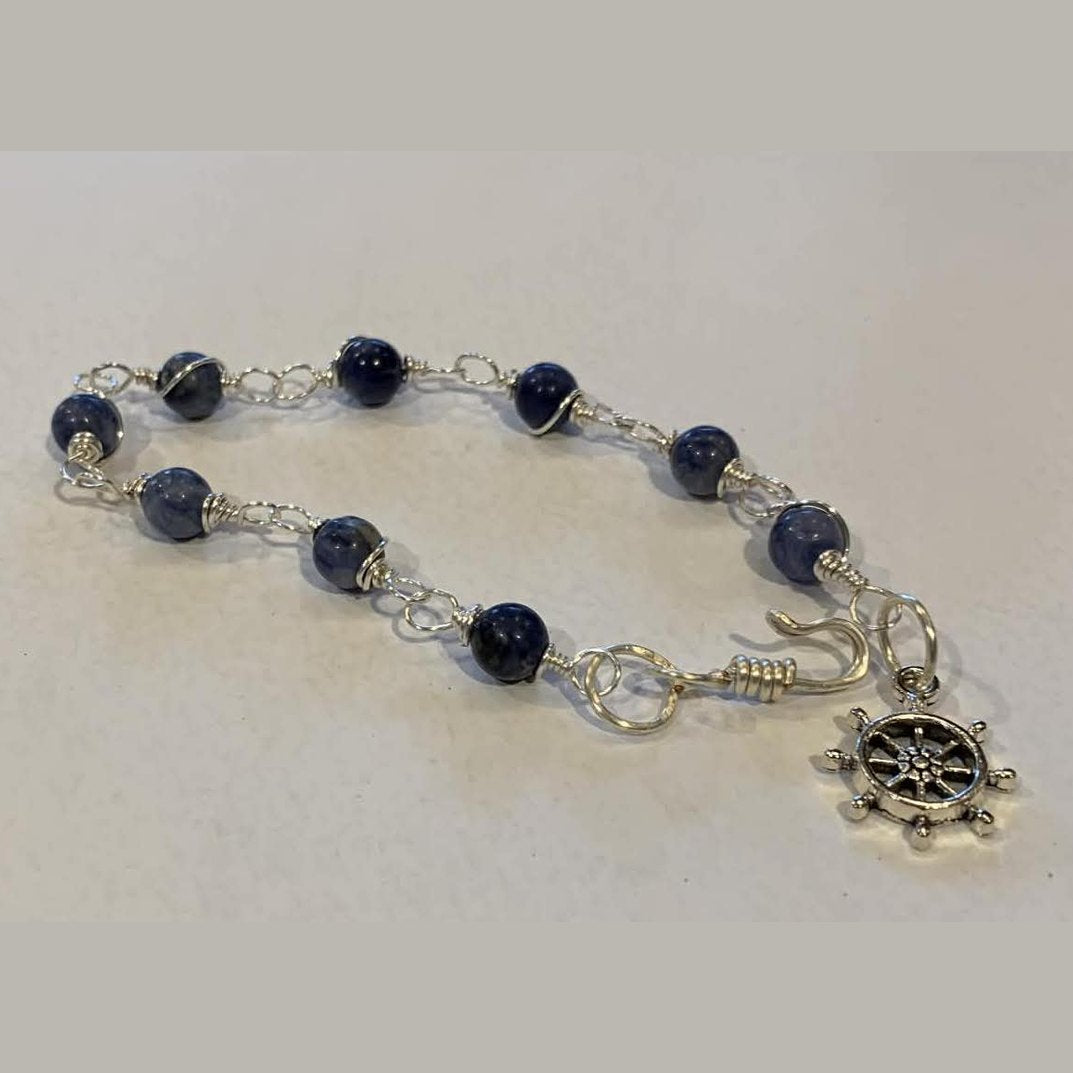 Blue jasper gemstone bracelet on wrist – handcrafted silver jewelry