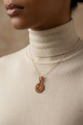Model wearing mystic aura quartz copper pendant