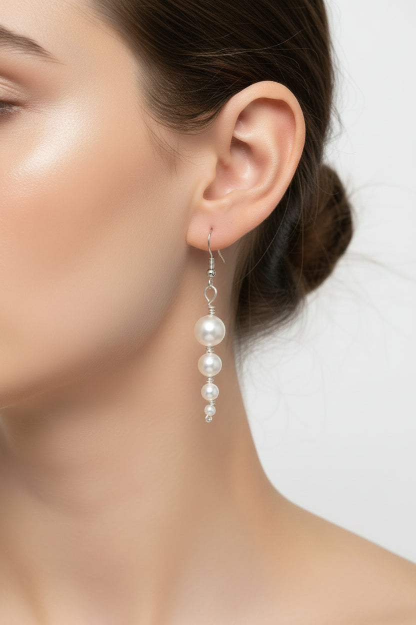 Model showing pear beads earrings