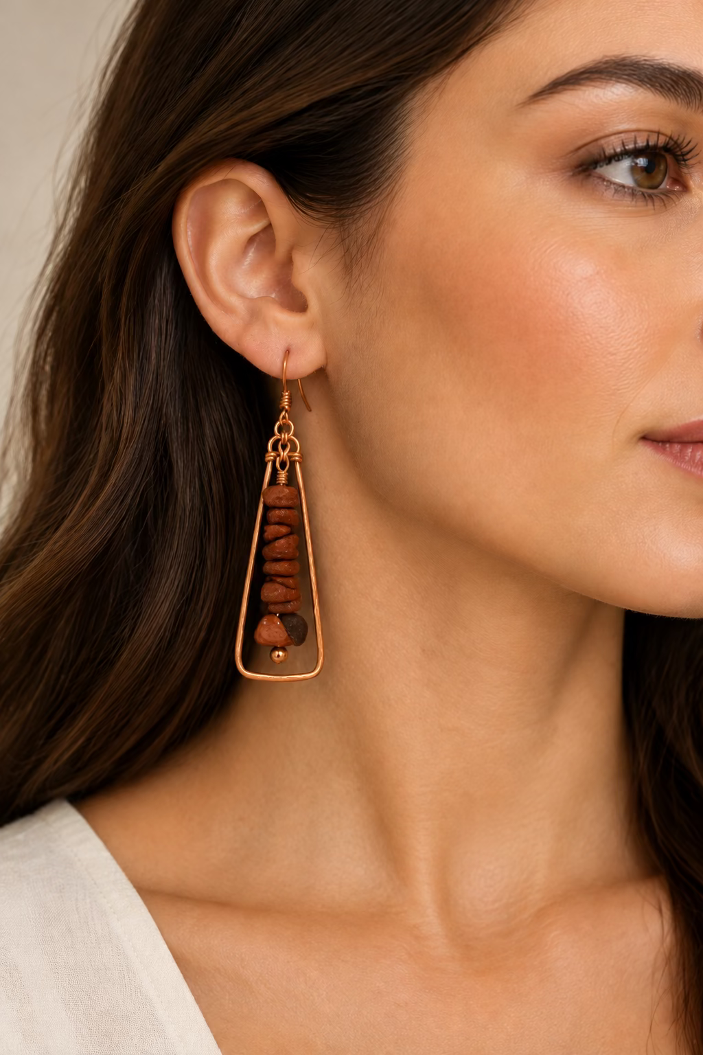 Terra Alchemy handcrafted copper and natural stone statement earring worn.